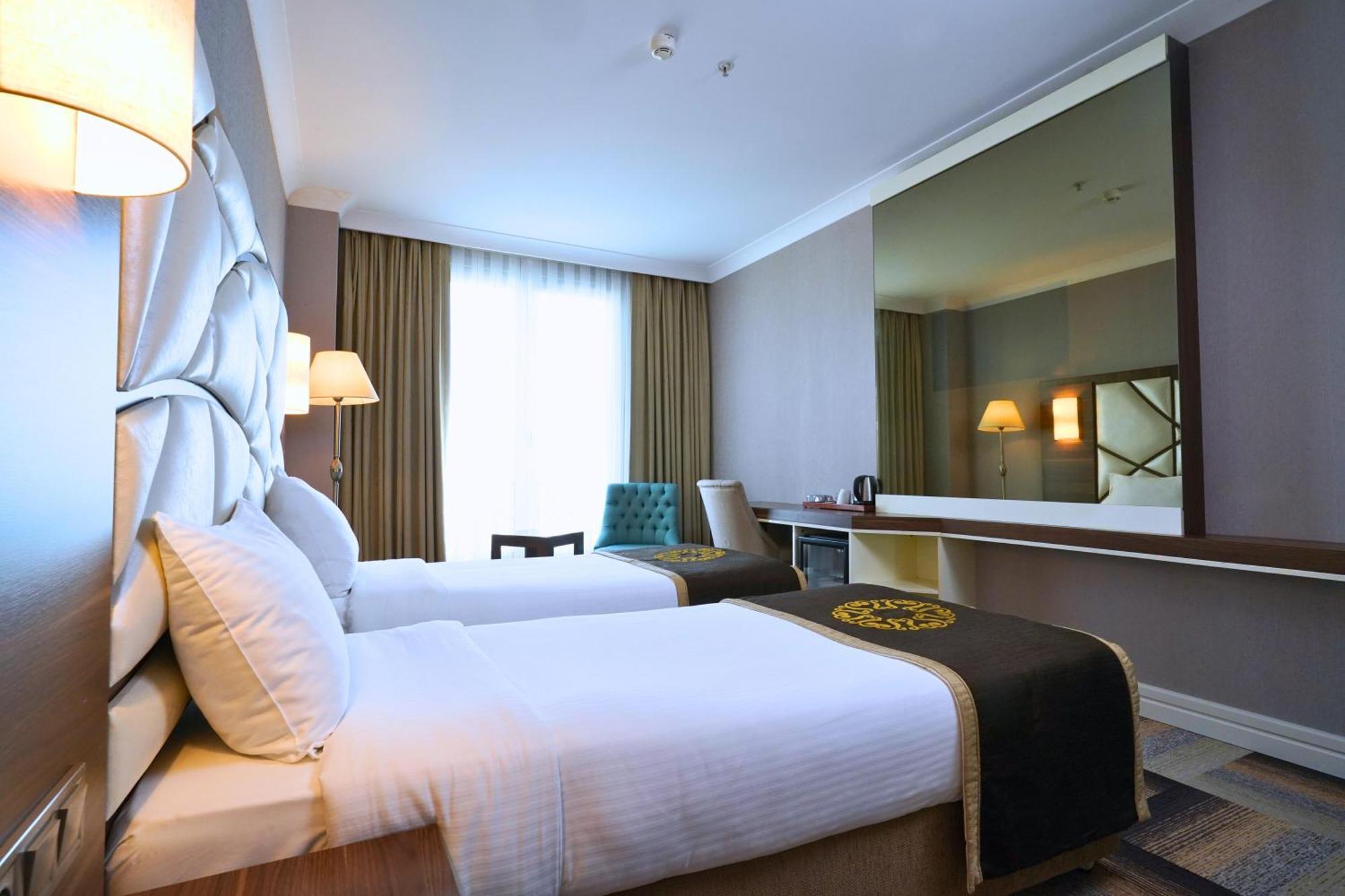 The Grand Mira Business Hotel — Photos 1